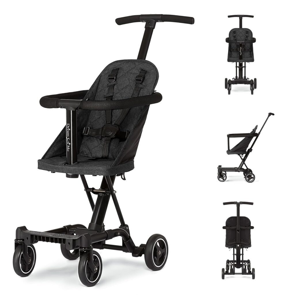 Dream On Me Lightweight Travel Stroller in black with padded seat, safety harness, and compact foldable frame – ideal for air travel and everyday use
