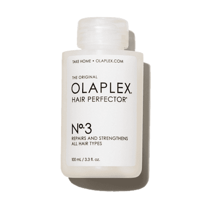 White bottle of Olaplex No. 3 Hair Perfector, a cult-favorite bond builder used to repair and strengthen hair from the inside out.