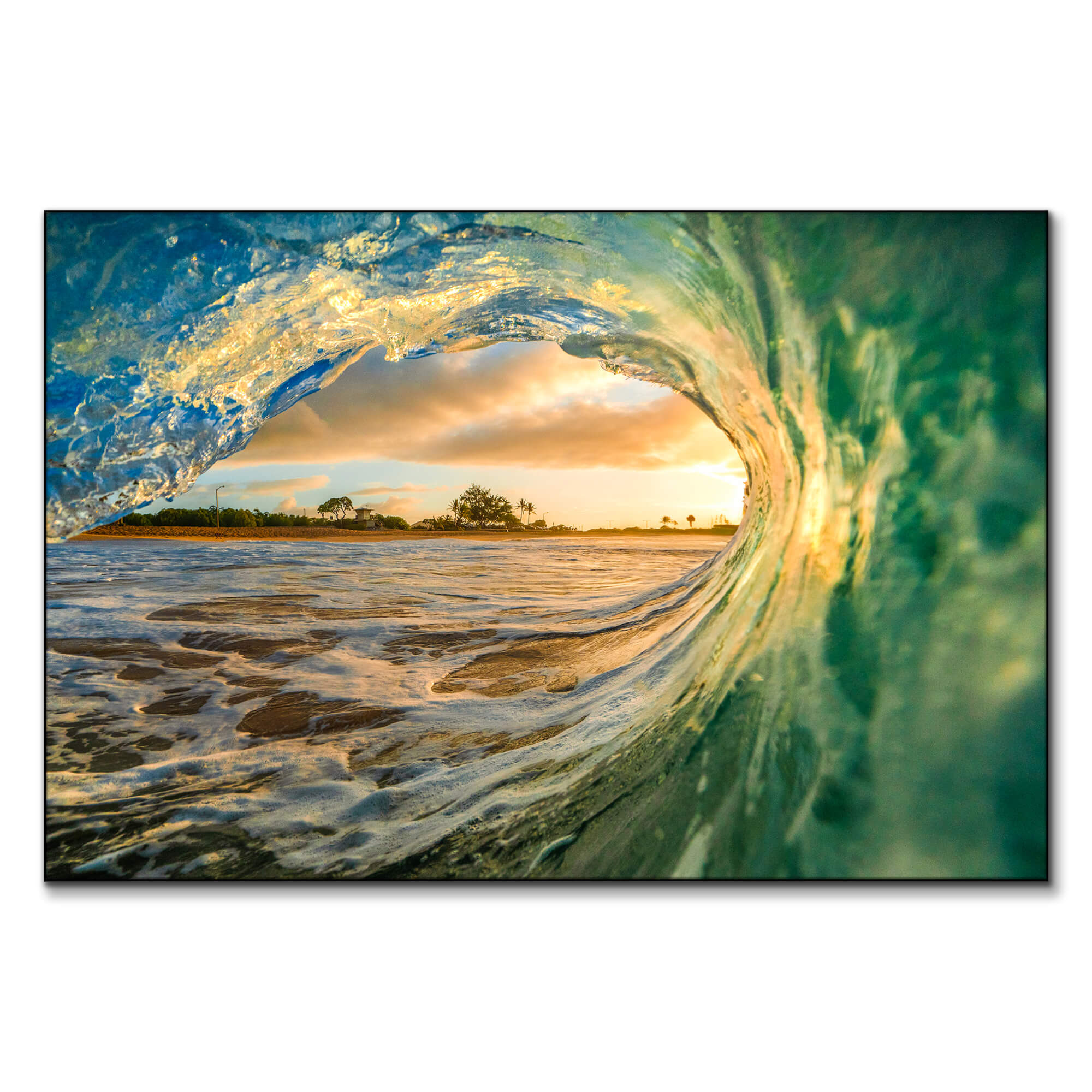 Oversized ocean wave photography print from Big Wall Décor, styled above a modern neutral couch. The image shows the view from inside a barreling wave — bold yet calming, perfect for a family space with a coastal or Caribbean vibe.