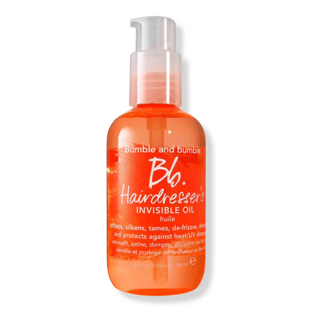 Lightweight heat protectant serum that softens and protects curly hair from styling damage.