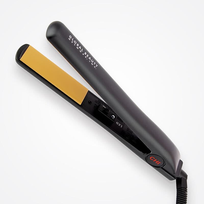 CHI Original Ceramic flat iron—classic straightener with even heat distribution for smooth, frizz-free styling on various curl types.