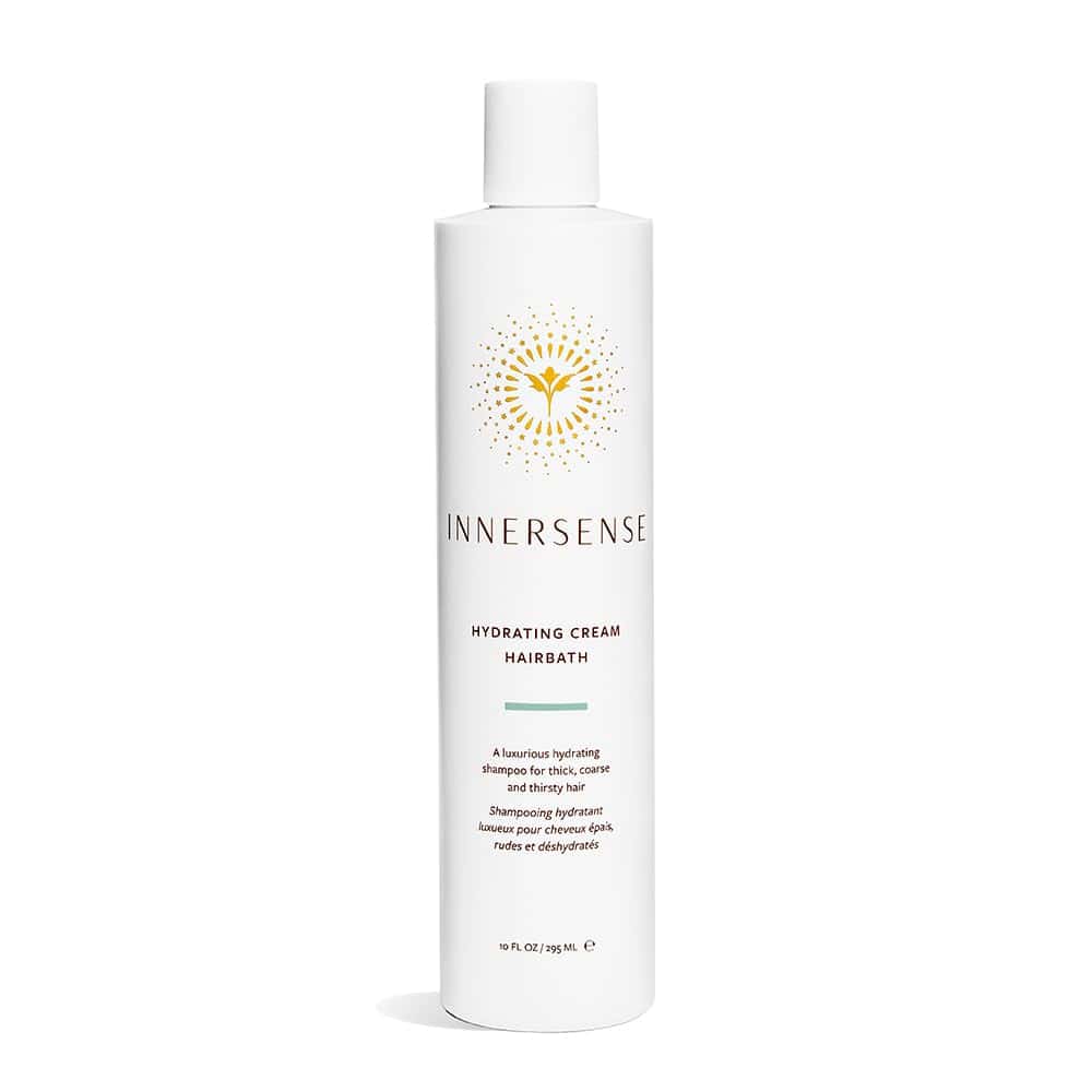 White bottle of Innersense Hydrating Cream Hairbath shampoo for dry, coarse curls