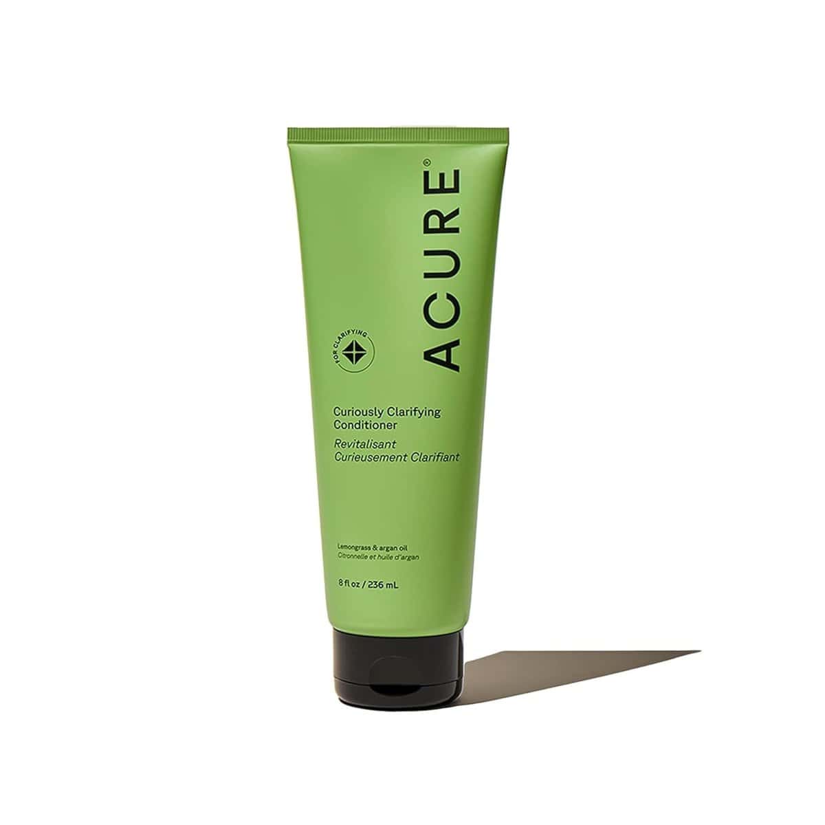 Bottle of Acure Curiously Clarifying Conditioner with lemongrass and argan oil for refreshed, lightweight hair.