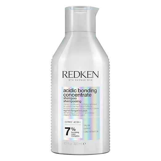 Redken Acidic Bonding Concentrate Shampoo bottle for color-treated hair.